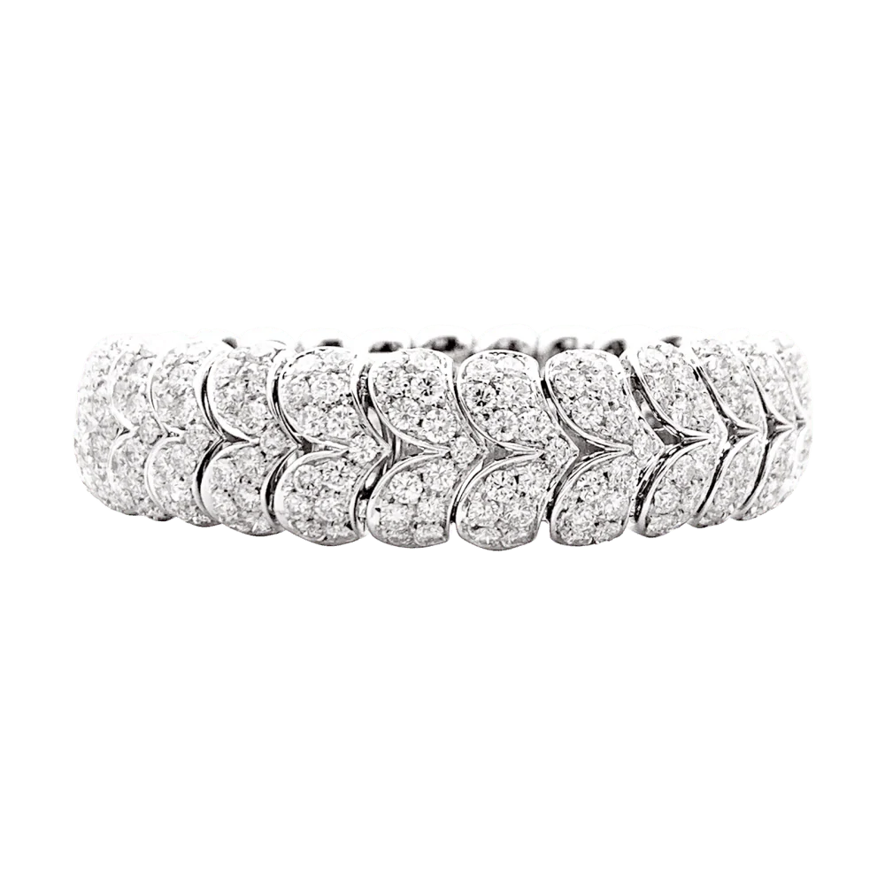 Bracelet Arfan, or blanc et diamants.