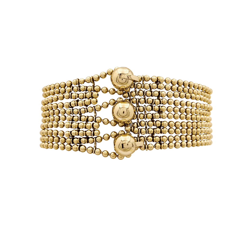 Bracelet Cartier modèle Draperie en or jaune.