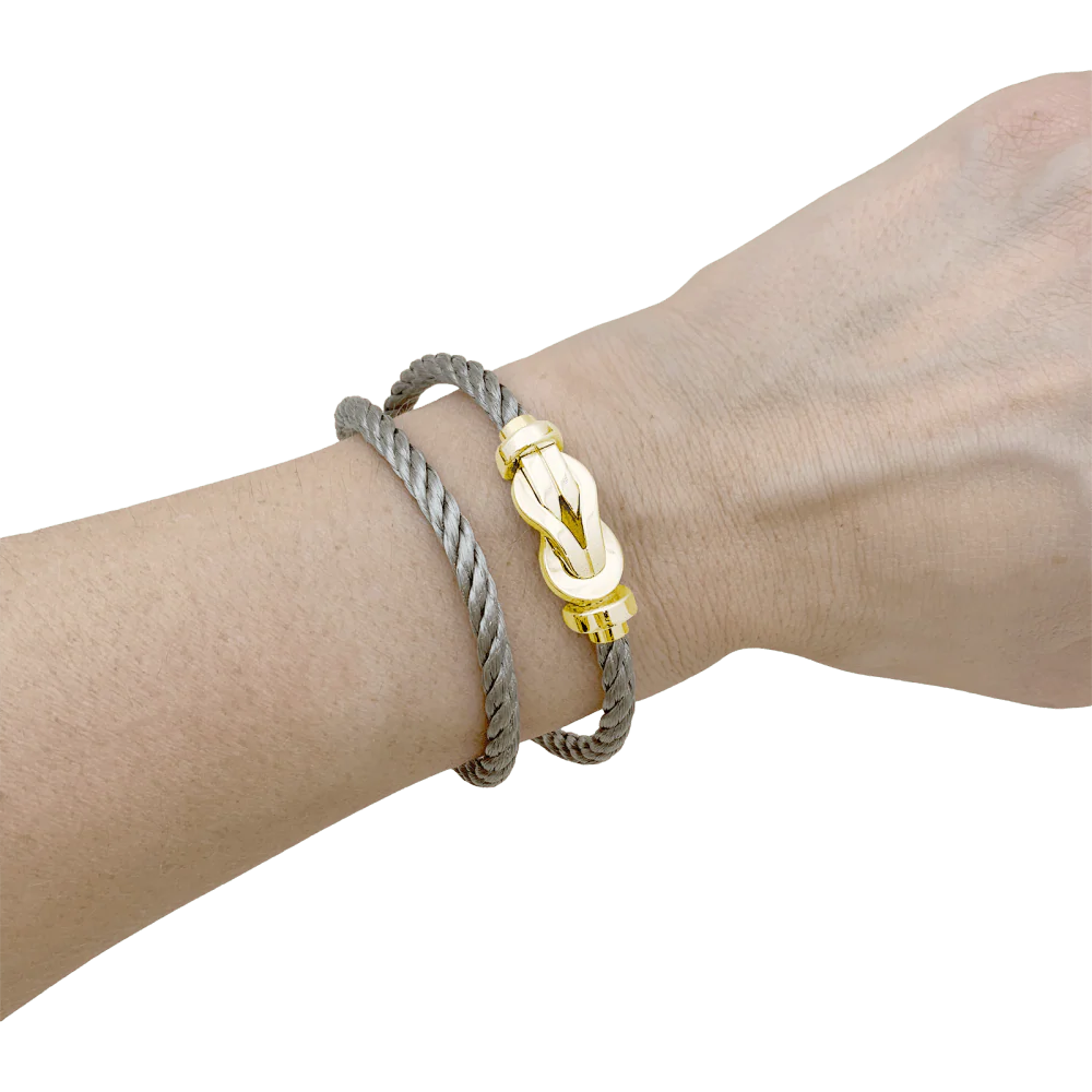 Bracelet Fred, "Chance infinie", or rose et acier. - Image 6