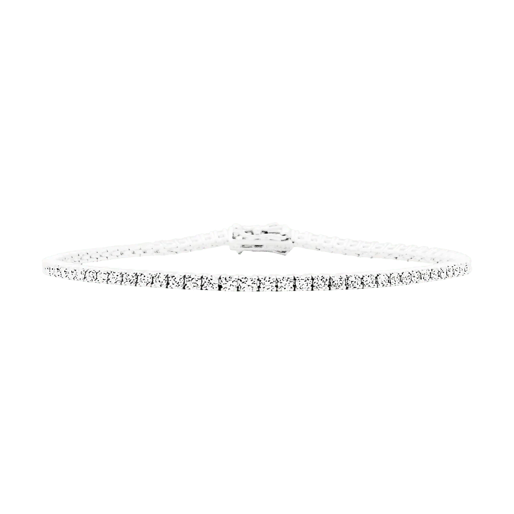 Bracelet ligne, or blanc et diamants.