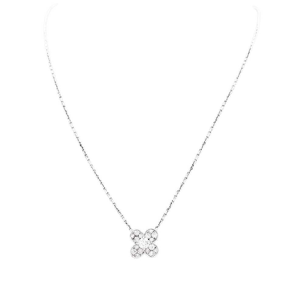 Collier Van Cleef & Arpels, "Trefle", or blanc et diamants.